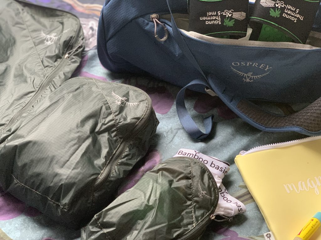 Osprey duffelbag en packing cubes